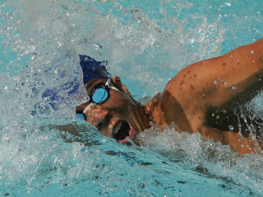 Coach Bryan Kim racing butterfly